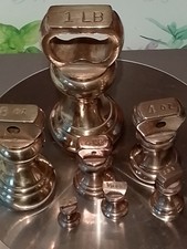 Vintage Set 7 Brass Weights sizes 1 lb/8oz/4oz/2oz/1oz/1/2oz and 1/4oz