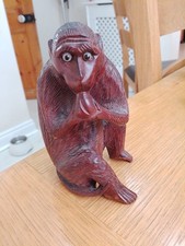 ASIAN HAND CARVED WOODEN MONKEY WITH GLASS EYES