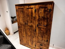 3 Door Wooden wardrobe with drawers used.