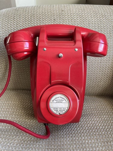 Vintage red bakelite telephone - red,