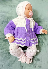 Hand knitted newborn baby