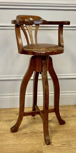 Antique child oak swivel