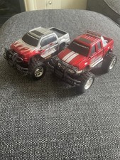 Two Toy Ford Trucks- Ford