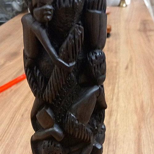 African figures climbing tree - african,
