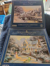 2 x 1000 piece Christmas themed Thomas Kinkade Jigsaw Puzzles. Gibsons.