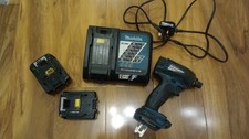 Makita DTD134 impact Driver / charger and batterys  working spares or repair 