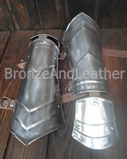pair of steel bracers with