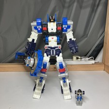 Transformers Cybertron Leader Class Metroplex & Mini con (2005) 