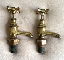 A PAIR OF VINTAGE 4.75" TALL x 3.875" LONG, ENGLISH BRASS HOT + COLD SINK TAPS