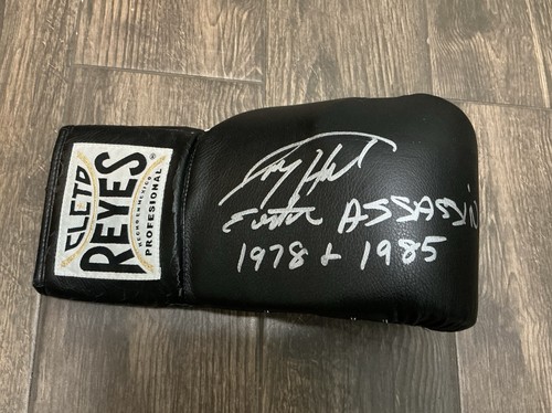 Larry holmes inscription - larry,