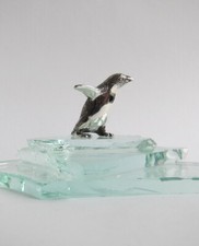 Penguin running figurine