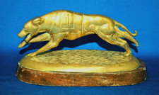 A lovely antique or vintage racing greyhound dog figure on wooden base