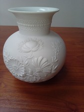 AK Kaiser White Bisque vase. Raised floral design. Model 385. 17cm high