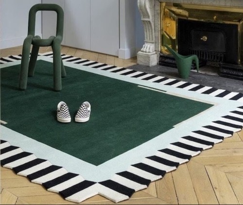 Unique border hand tufted rug