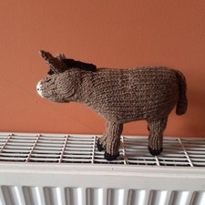 Newly hand knitted light - hand, brown