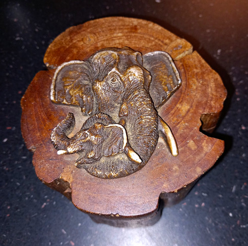 Small brown wooden elephant - wooden,