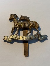 BRITISH ARMY WEST SURREYS CAP BADGE.
