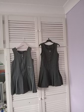 Two girls school pinafore