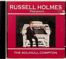 Russell Holmes- Presents The