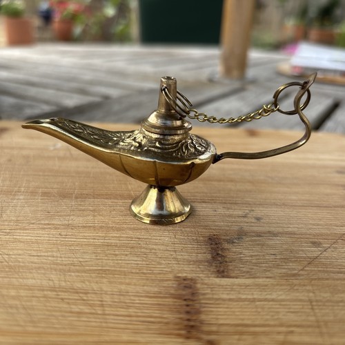 Tiny aladdin style genie lamp - genie,