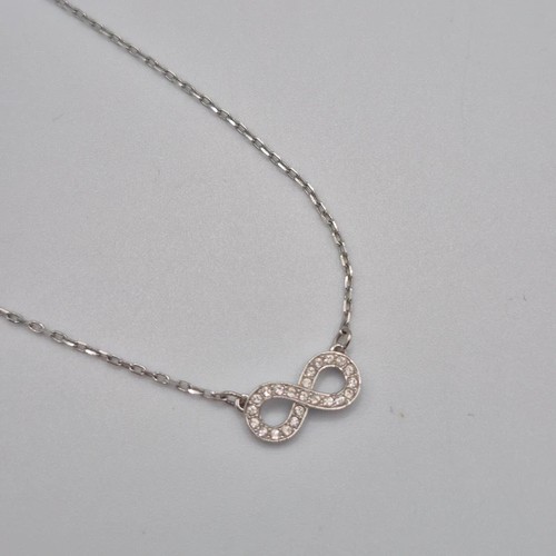 Swarovski infinity figure - swarovski,