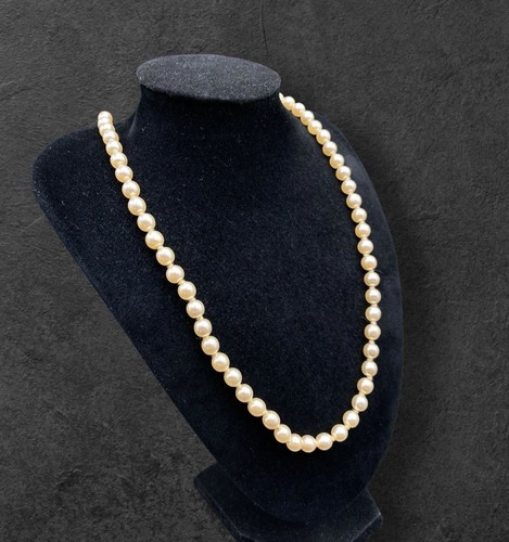 Faux pearl necklace with - with, a