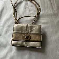 Gold cross body Coach mini Coach
