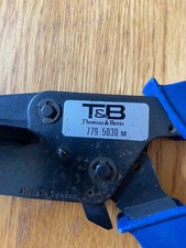 Ribbon cable shears by Thomas and Betts. Used. Sharp cutting edge.