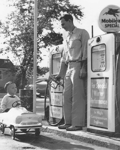Boy rides pedal - pedal, car