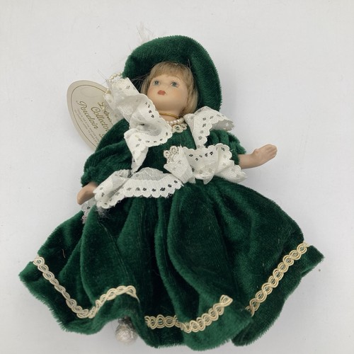 Leonardo porcelain doll green - porcelain,