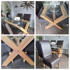 glass and wood dinning table 4 high back brown leather chairs 3yrs old immaculat