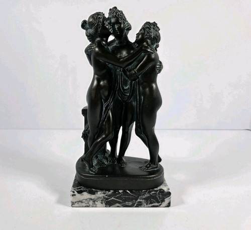 The three graces statue - three,