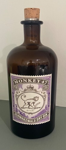 Monkey empty gin bottle - gin,