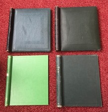 Four spring back stamp albums