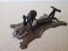 Geschutzt  Cold Painted Boy on Tiger Skin, 12.5cms Long x 8cms Wide  359grms