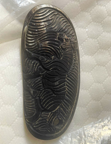 Black oval carved buffalo - ,