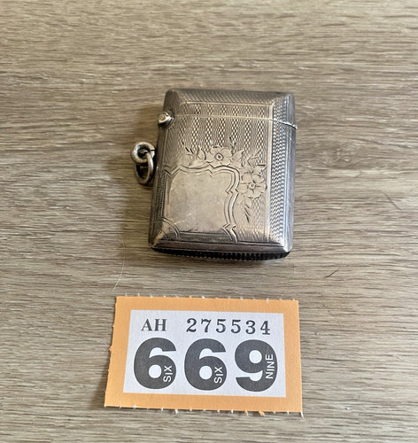 Silver vesta case with engine