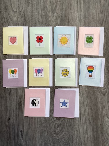 Hand made cross stitched cards - made,