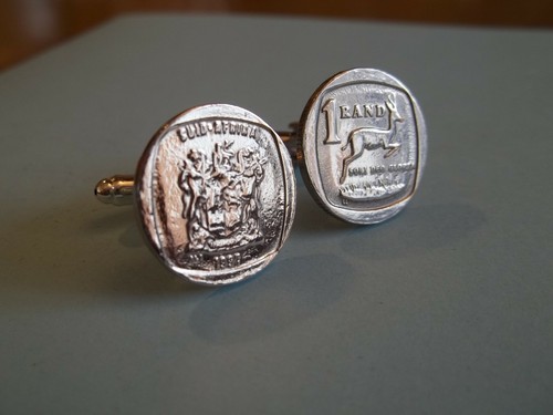 One rand coins - one,