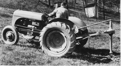 1950s man roper tractor - 1950s,