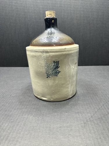 Western stoneware whiskey jug - stoneware,