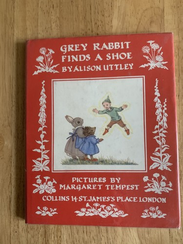 Grey rabbit finds shoe - finds,
