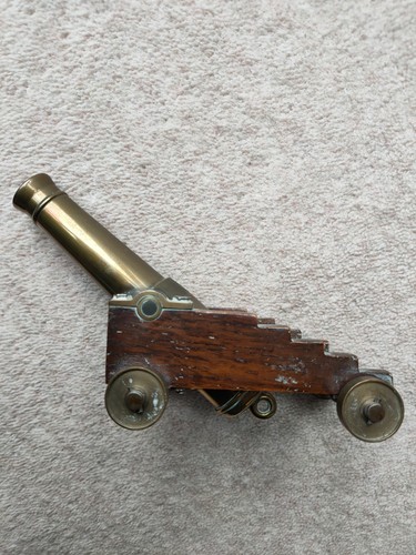 Brass and oak cannon - a,