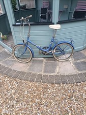 BSA FOLDING BICYCLE IN VERY GOOD CONDITION FOR AGE.