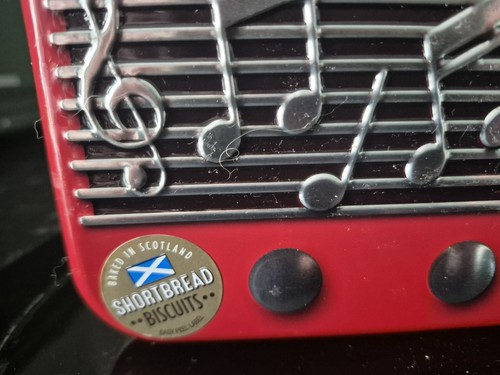 Musical biscuit tin - musical,