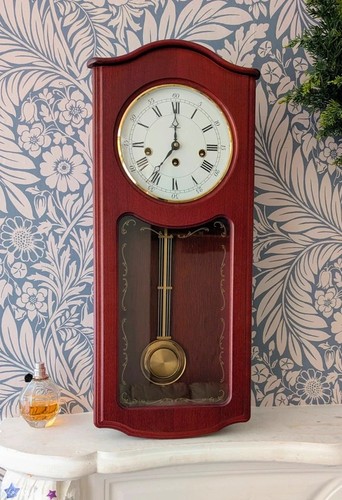 Vintage pendulum wall clock