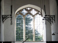 Photo 6x4 The church of All Saints - west window with bell ropes Norton S c2009