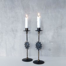 Pair of vintage 1990s celestial sun face metal black gold candle holders