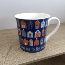 Blue Beach Hut Hug Elgate Take