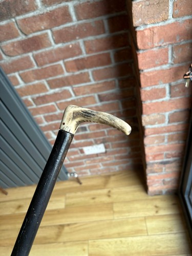 Black wooden walking stick - wooden,